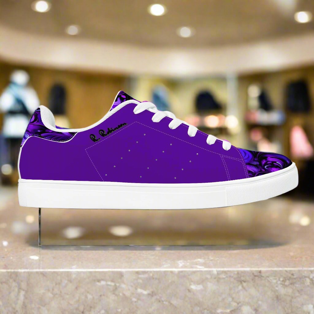 Purple sneaker with white laces on a clear stand in a store setting