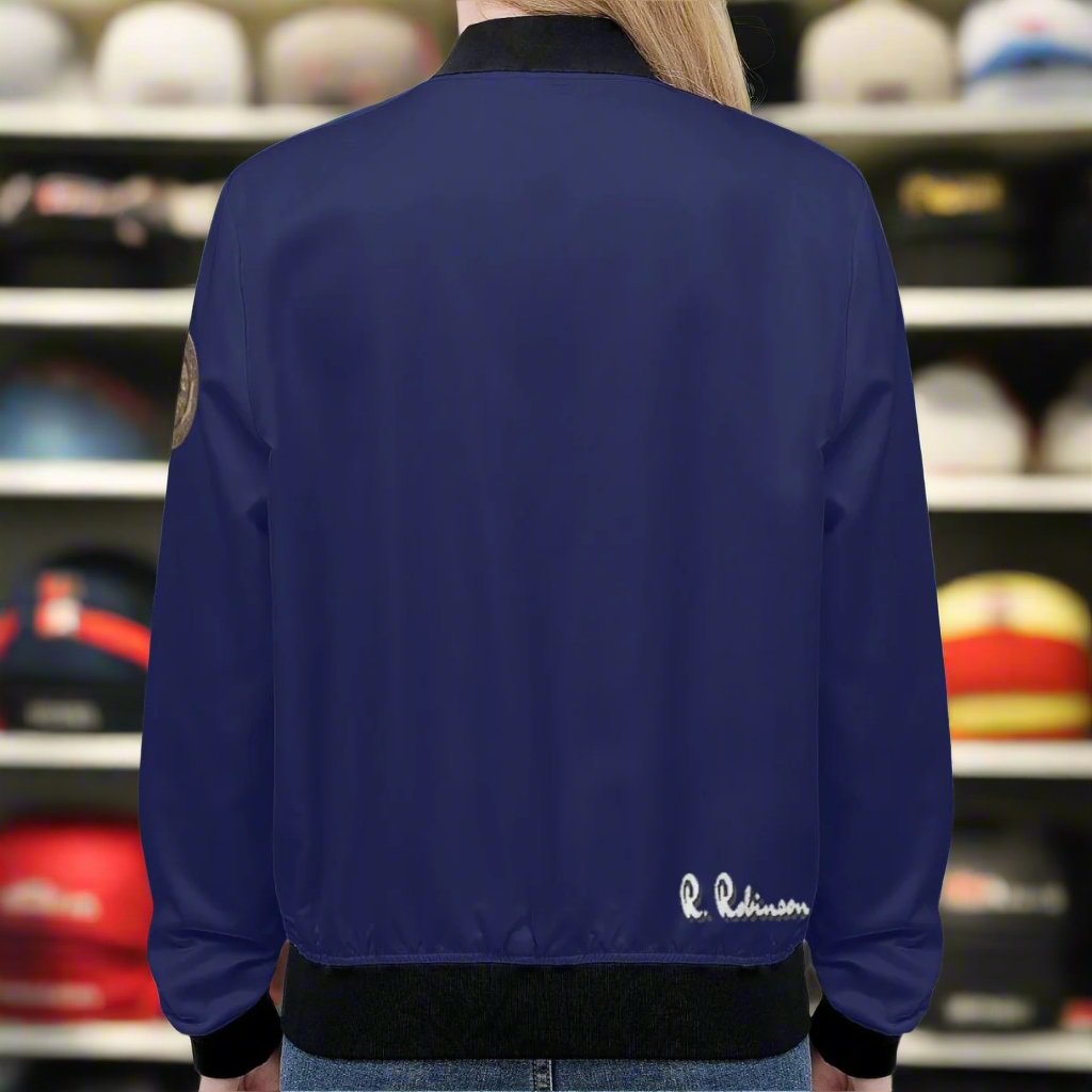 Indulge in our Classic Royal Blue Women's Bomber Jacket, handmade with a premium polyester blend and soft lining for ultimate comfort. Durable reinforced cuffs and waist, with two roomy pockets for convenience. This classic zipper-up jacket exudes sophistication and elegance. Machine washable for easy care.