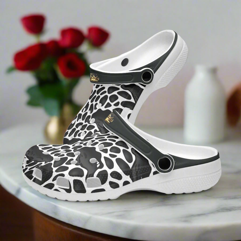 Step into a new dimension of style with our 313rd Dimension Printed Clogs! Made with soft, lightweight EVA material, these unisex clogs are perfect for both indoor and outdoor wear. Plus, don't forget to add the matching jacket to your order for a special 2 for $50 deal! Comfort, durability, and style all in one product. Shop now!