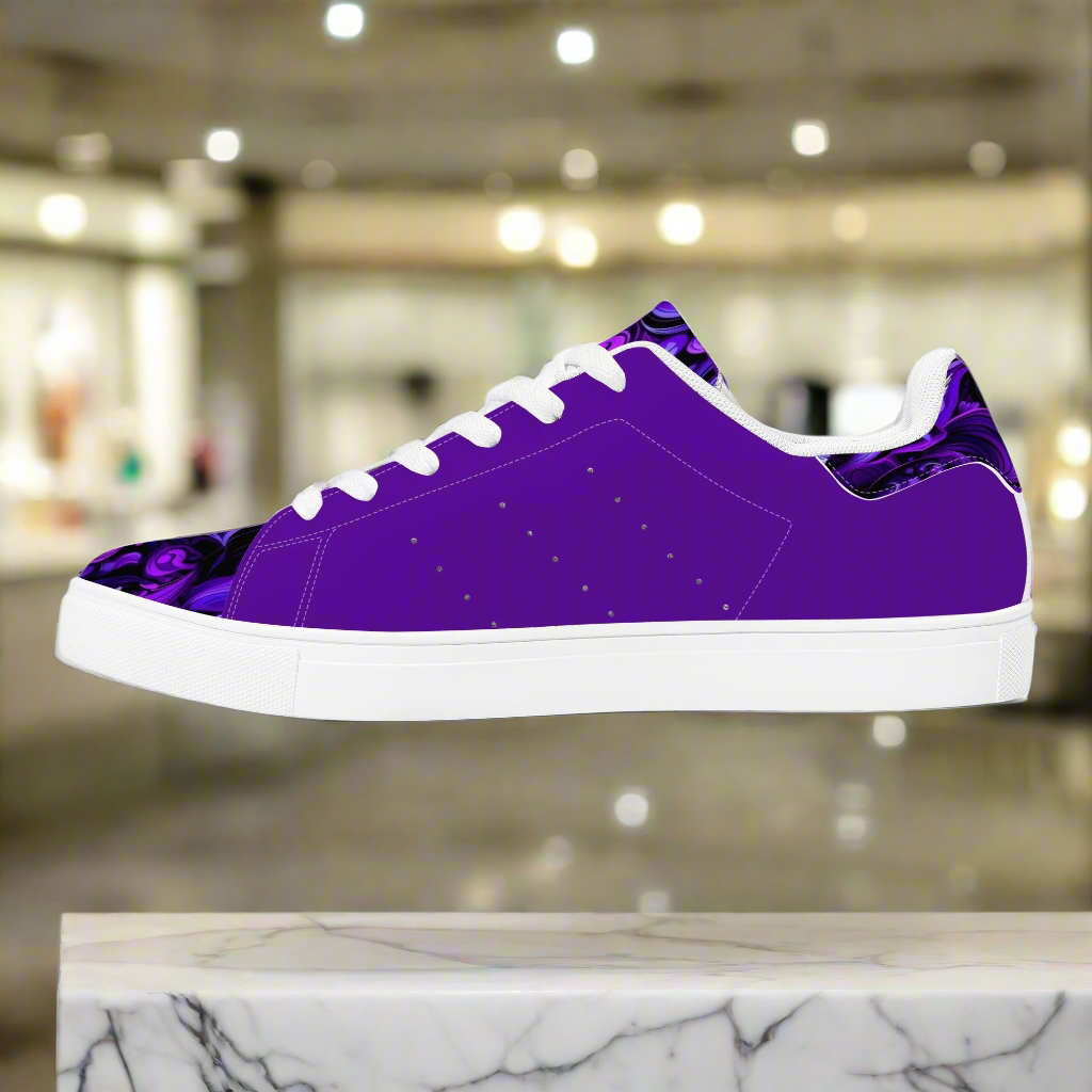 Step into comfort and style with these Elegant Purp print Classic Low-Top Leather Sneakers, designed for everyone. Featuring a striking all-over-print leather upper paired with breathable mesh lining, these unisex sneakers deliver both visual impact and wearability. The soft EVA padded insoles provide cushioning for all-day comfort, while the timeless lace-up closure and classic eyelets ensure a secure, adjustable fit. Perfect for casual wear or making a statement, these sneakers blend contemporary design w