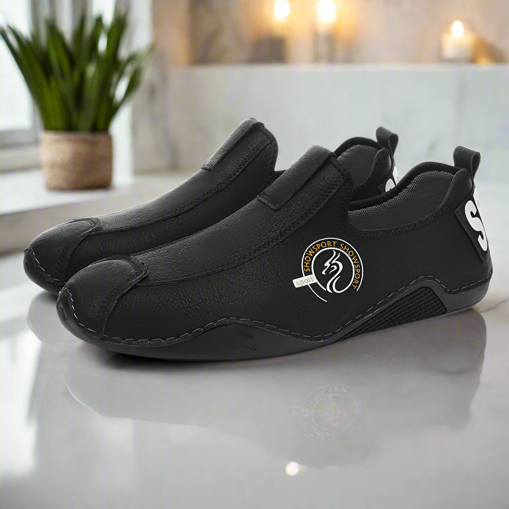 Black  shoes with a logo on a white background