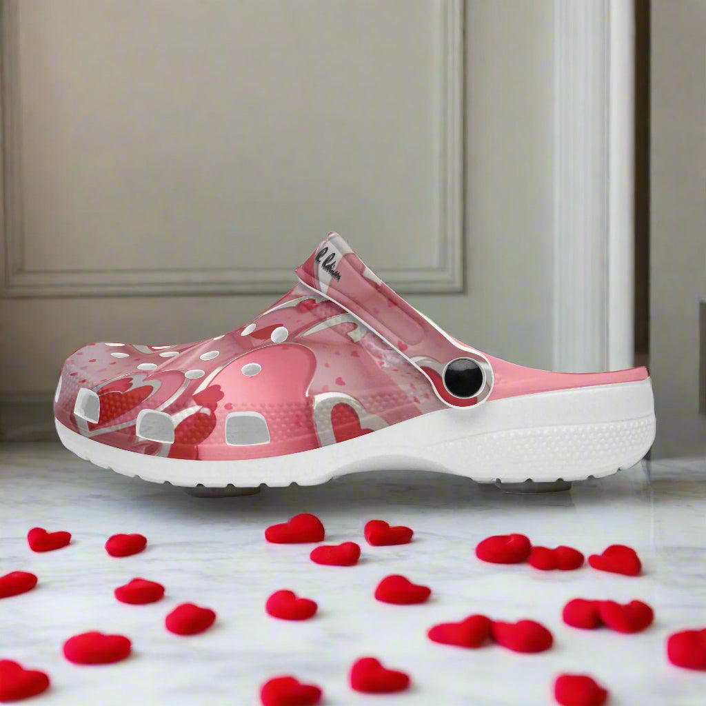 The Love1 Printed Clogs are designed to be versatile and practical for both men and women. Made with soft lightweight EVA upper vamps, these clogs provide comfort and support for all-day wear. The durable outsole offers excellent anti-slip performance, making them suitable for indoor and outdoor activities. Plus, they can also be worn as flip-flops or sandals for added convenience and style. Available with a matching jacket for a complete look. Step into comfort and style with the Love1 Printed Clogs.