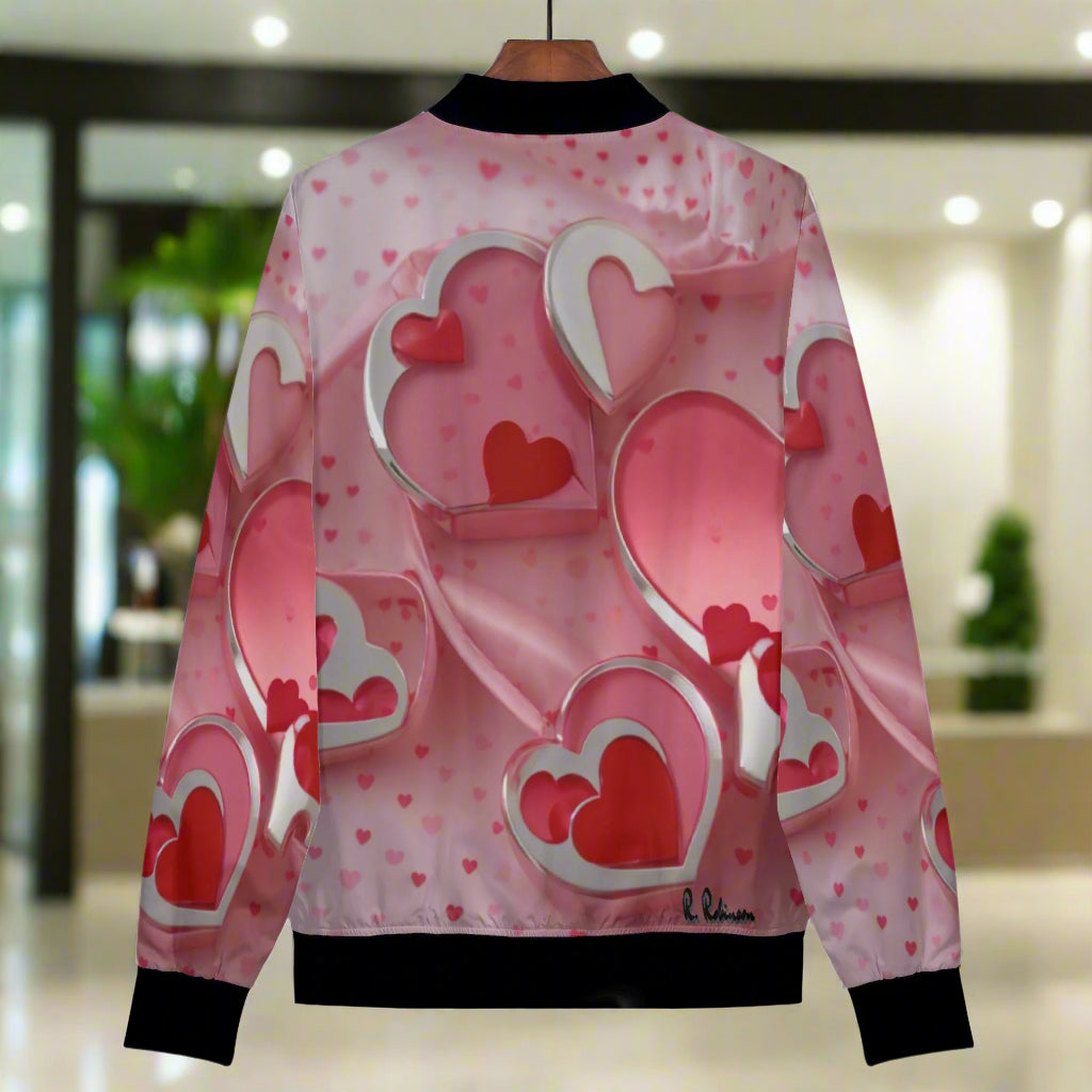 This Love1 print Women's Bomber Jacket combines style and comfort with its premium polyester blend fabric and soft lining. Handmade with reinforced cuffs and waist, it offers durability for everyday wear. Featuring two spacious front pockets and a classic zipper closure, it’s both practical and fashionable.
