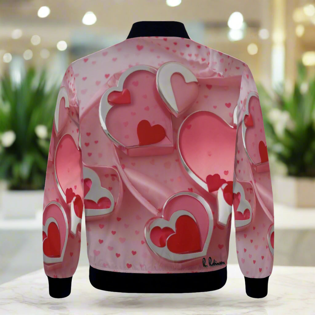 This Love1 print Women's Bomber Jacket combines style and comfort with its premium polyester blend fabric and soft lining. Handmade with reinforced cuffs and waist, it offers durability for everyday wear. Featuring two spacious front pockets and a classic zipper closure, it’s both practical and fashionable.