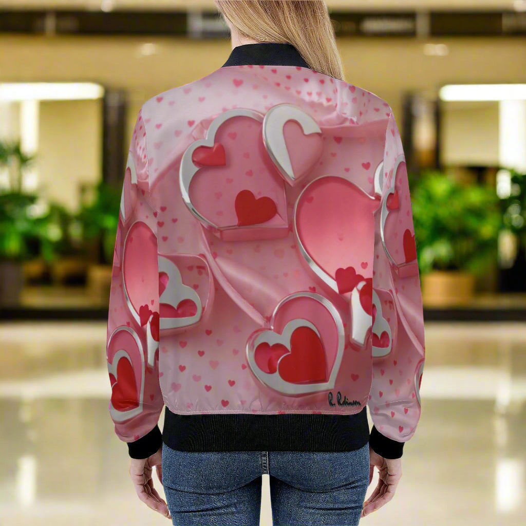 This Love1 print Women's Bomber Jacket combines style and comfort with its premium polyester blend fabric and soft lining. Handmade with reinforced cuffs and waist, it offers durability for everyday wear. Featuring two spacious front pockets and a classic zipper closure, it’s both practical and fashionable.