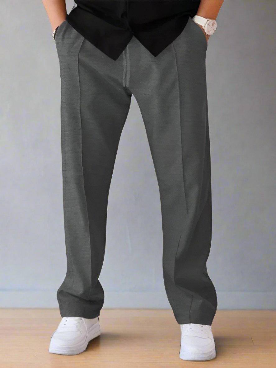 Experience luxurious comfort and sophisticated style with our Men's Creased Loose Fitting Casual Pants. Crafted with high-quality 90% polyester and 10% cotton materials, these pants offer slight elasticity for the perfect fit. The solid pattern and knit weaving make for a versatile, four-season wardrobe staple. Complete with a welt pocket for added convenience.