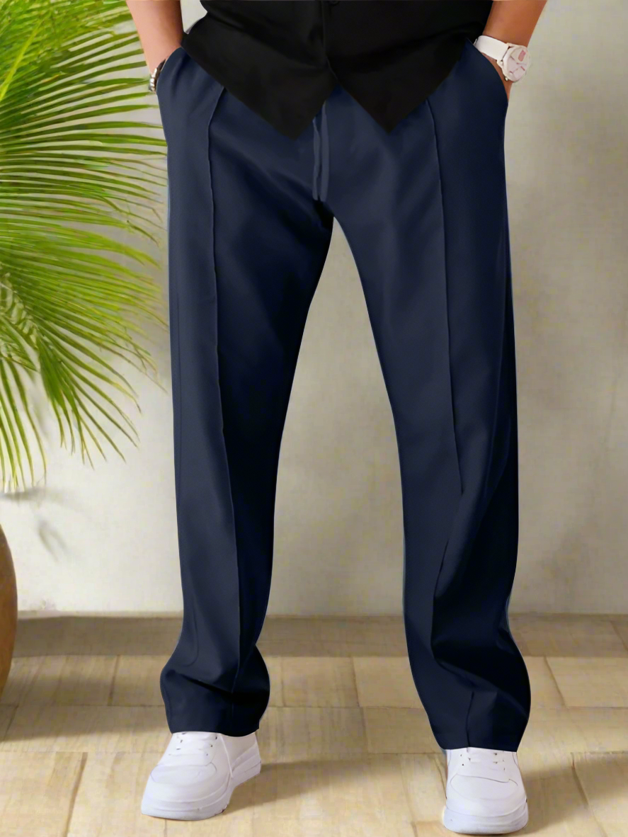 Experience luxurious comfort and sophisticated style with our Men's Creased Loose Fitting Casual Pants. Crafted with high-quality 90% polyester and 10% cotton materials, these pants offer slight elasticity for the perfect fit. The solid pattern and knit weaving make for a versatile, four-season wardrobe staple. Complete with a welt pocket for added convenience.