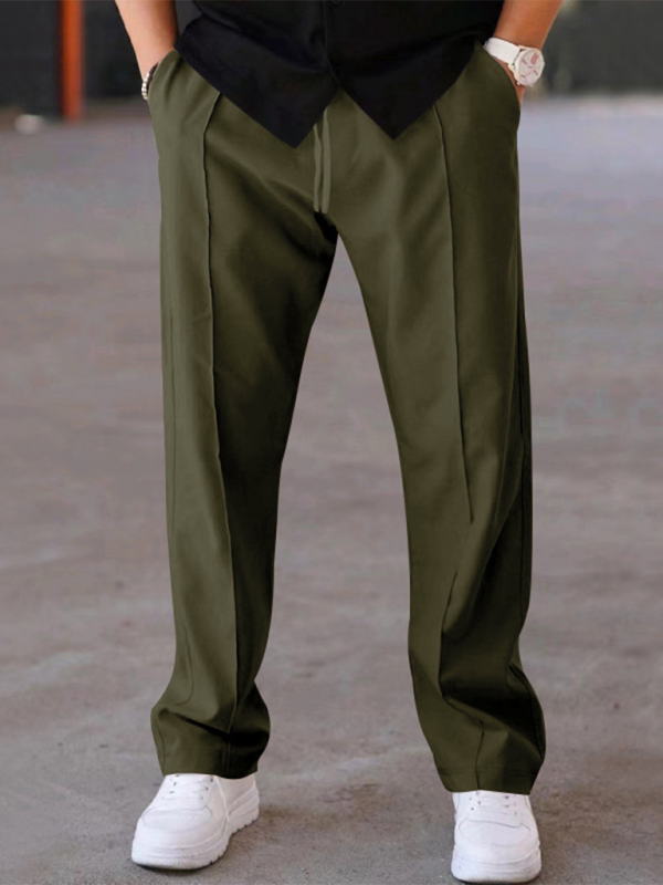 Experience luxurious comfort and sophisticated style with our Men's Creased Loose Fitting Casual Pants. Crafted with high-quality 90% polyester and 10% cotton materials, these pants offer slight elasticity for the perfect fit. The solid pattern and knit weaving make for a versatile, four-season wardrobe staple. Complete with a welt pocket for added convenience.