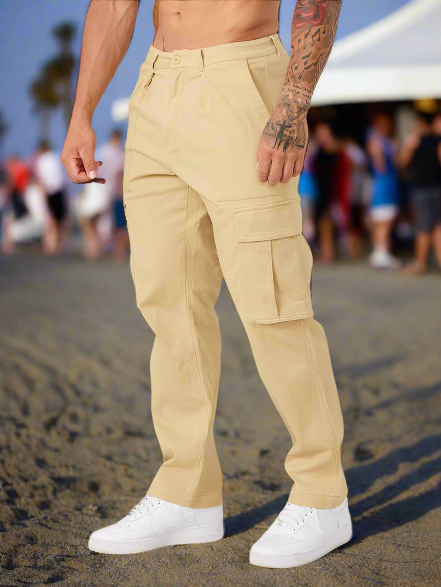 Experience luxury and comfort with our Men's solid color casual sports loose cargo pants. Made with high-quality 100% polyester and designed with a slight elasticity for a perfect fit. Featuring flap pockets, and a lightweight of 353 g, these pants are perfect for spring and summer. Embrace leisure in style.