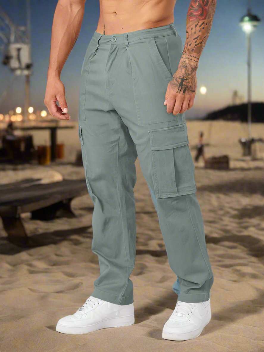 Experience luxury and comfort with our Men's solid color casual sports loose cargo pants. Made with high-quality 100% polyester and designed with a slight elasticity for a perfect fit. Featuring flap pockets, and a lightweight of 353 g, these pants are perfect for spring and summer. Embrace leisure in style.