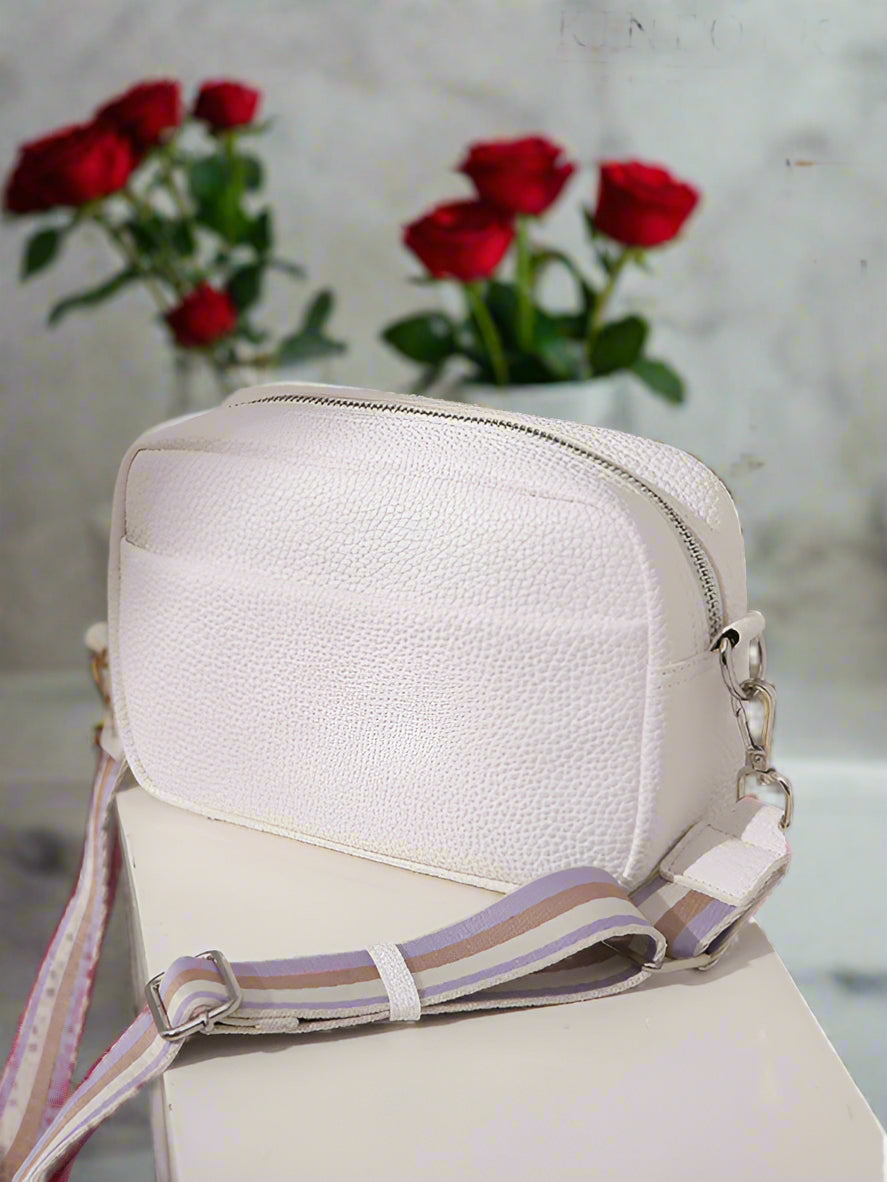 Elevate your style with our solid color messenger bag, designed just for women. The lightweight PU material offers durability and a sleek finish. Perfect for any occasion, this small square bag adds a pop of color to your look. No pockets to keep the design streamlined. Trust our size guide for the perfect fit.