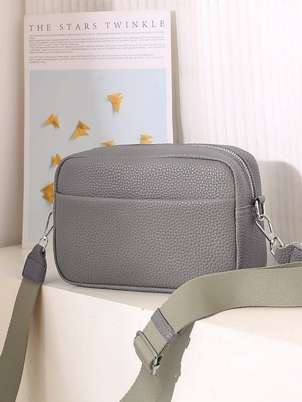 Elevate your style with our solid color messenger bag, designed just for women. The lightweight PU material offers durability and a sleek finish. Perfect for any occasion, this small square bag adds a pop of color to your look. No pockets to keep the design streamlined. Trust our size guide for the perfect fit.