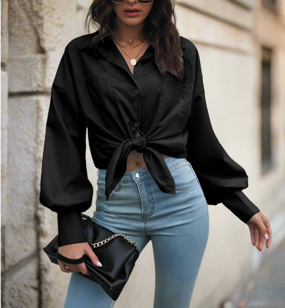 Indulge in luxury with our Women's Lantern Sleeve Long Sleeve Shirt. Made from a blend of 85% Polyester and 15% Cotton, this shirt offers all-day comfort. The lantern sleeves and drop shoulder design add a trendy touch to your wardrobe. Pair it with jeans or trousers for a chic and sophisticated outfit suitable for any occasion.