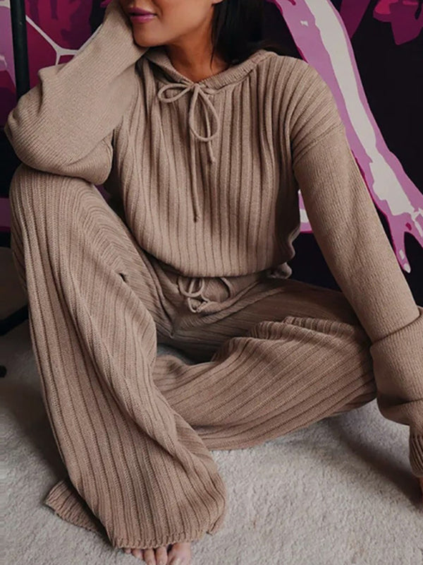 Indulge in luxury with our Women's Long Sleeve Loose Hooded Casual Suit. Made of a luxurious cotton blend, this elegant and stylish suit features dropped shoulder sleeves and a comfortable hooded collar. Perfect for autumn-winter seasons, this knit suit is an exclusive addition to your wardrobe. Choose from a variety of beautiful colors and feel effortlessly beautiful and charming.