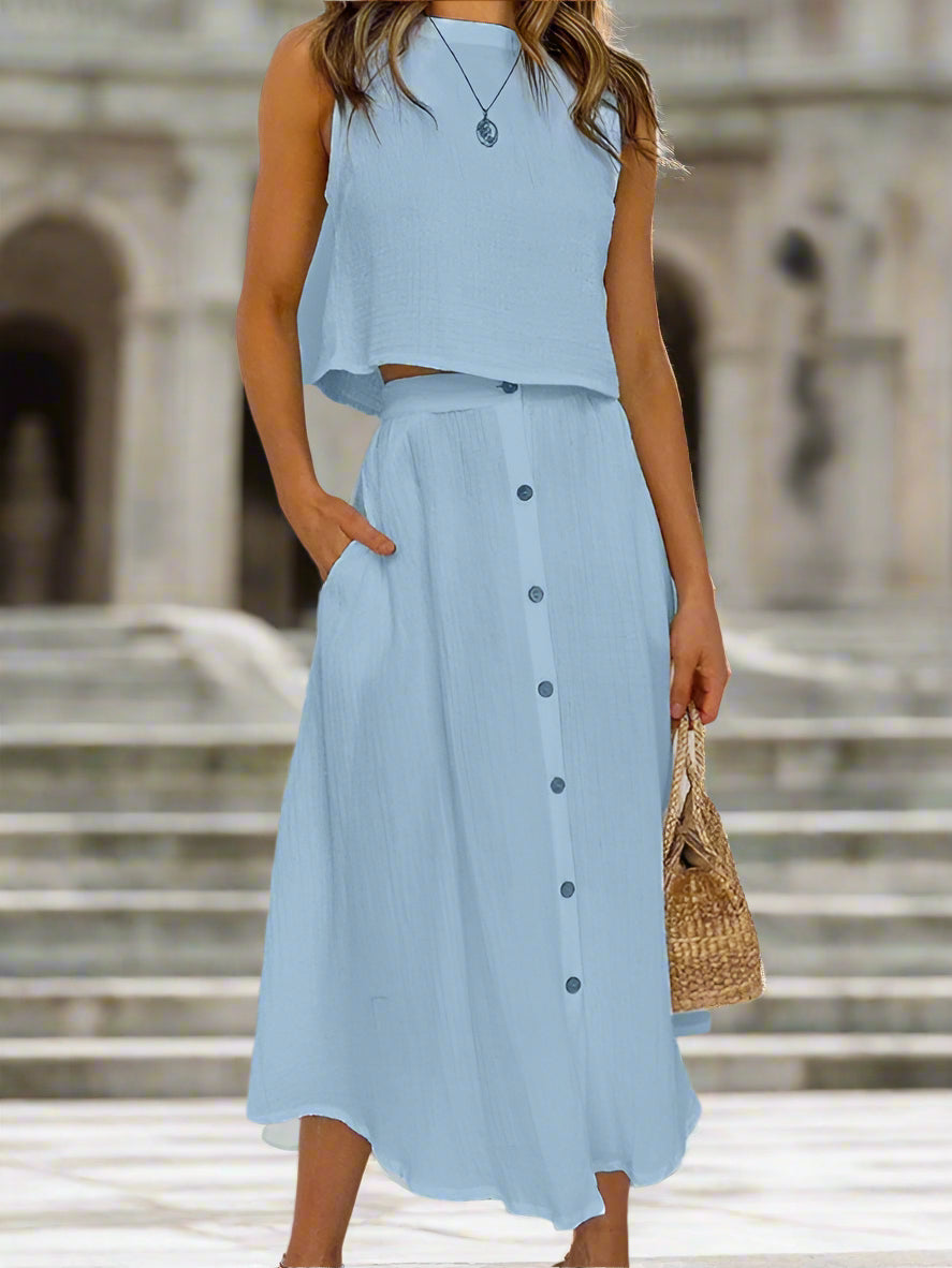 Elevate your wardrobe with our Women's Round Neck Tank Mid-length Breasted Two-Piece Dress. With a sophisticated retro style and high-quality woven fabric, this dress is perfect for spring and summer. The dropped shoulder sleeves and slant pocket add a touch of luxury, while the true-to-size fit and solid pattern make it both comfortable and fashionable. Made with a blend of cotton and polyester, this dress is both elegant and functional.