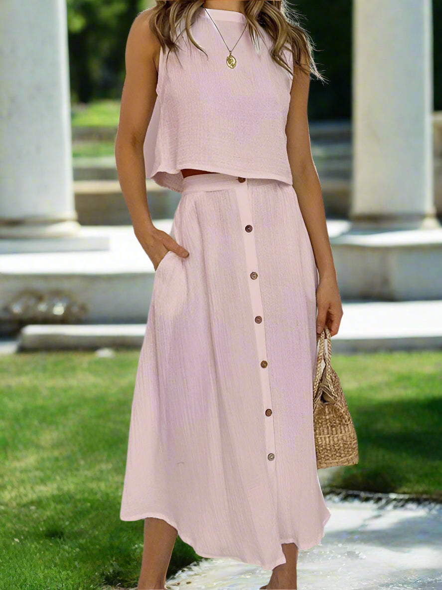 Elevate your wardrobe with our Women's Round Neck Tank Mid-length Breasted Two-Piece Dress. With a sophisticated retro style and high-quality woven fabric, this dress is perfect for spring and summer. The dropped shoulder sleeves and slant pocket add a touch of luxury, while the true-to-size fit and solid pattern make it both comfortable and fashionable. Made with a blend of cotton and polyester, this dress is both elegant and functional.