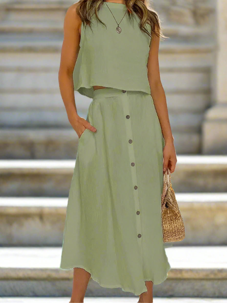 Elevate your wardrobe with our Women's Round Neck Tank Mid-length Breasted Two-Piece Dress. With a sophisticated retro style and high-quality woven fabric, this dress is perfect for spring and summer. The dropped shoulder sleeves and slant pocket add a touch of luxury, while the true-to-size fit and solid pattern make it both comfortable and fashionable. Made with a blend of cotton and polyester, this dress is both elegant and functional.