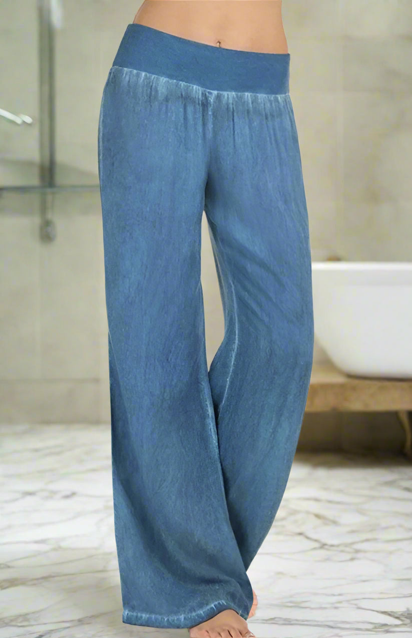 Embrace effortless style with these women's thin denim wide-legged pants. Perfect for spring and summer, they feature a comfortable high waist and a relaxed fit, offering a chic yet casual look. Ideal for pairing with crop tops or casual tees for a laid-back vibe.