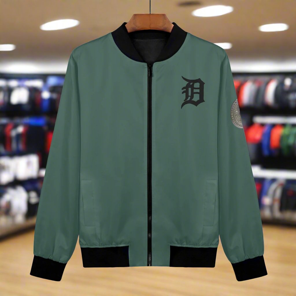 Indulge in luxury with the Classic Money Green Detroit D's Women’s Bomber Jacket. Handmade with premium polyester blend fabric and soft polyester lining, this jacket guarantees a comfortable wear. The reinforced cuffs and waist add durability, while the 2 spacious front pockets provide essential storage. Complete with an exquisite design and zipper-up closure, this jacket exudes elegance and sophistication. Care for it with gentle machine wash and low-heat tumble dry.