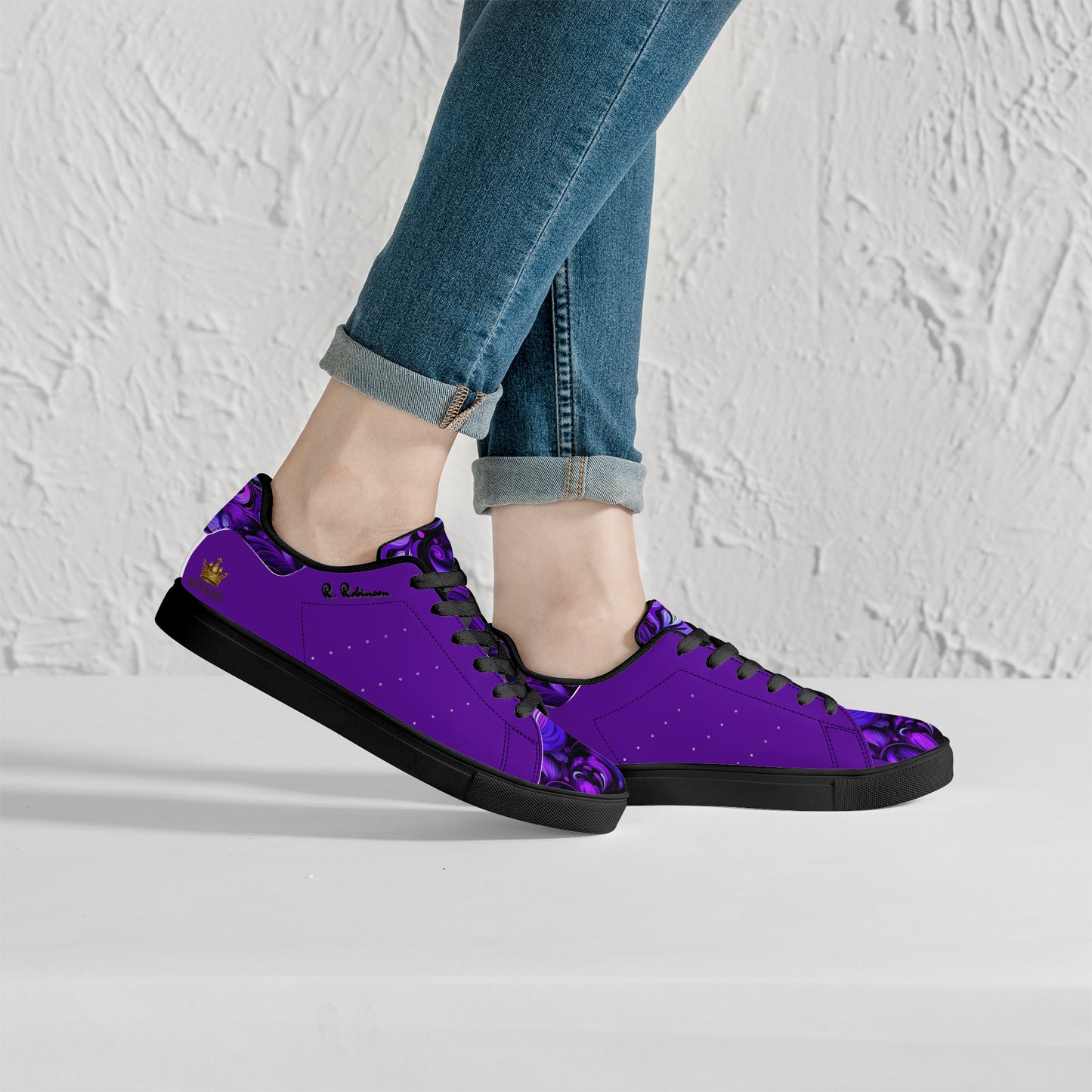 Step into comfort and style with these Elegant Purp print Classic Low-Top Leather Sneakers, designed for everyone. Featuring a striking all-over-print leather upper paired with breathable mesh lining, these unisex sneakers deliver both visual impact and wearability. The soft EVA padded insoles provide cushioning for all-day comfort, while the timeless lace-up closure and classic eyelets ensure a secure, adjustable fit. Perfect for casual wear or making a statement, these sneakers blend contemporary design w