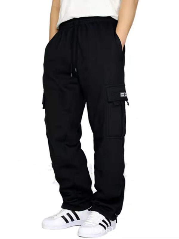 Elevate your style with our Multi-pocket men's baggy jogging pants. Made from premium 100% polyester, these pants are perfect for all four seasons. With a self design pattern and flap pockets, they offer both practicality and sophistication. Mix and match with our Black Friday Christmas Bundle 5 for $100 for a versatile and stylish wardrobe. The perfect blend of comfort and elegance for any occasion.