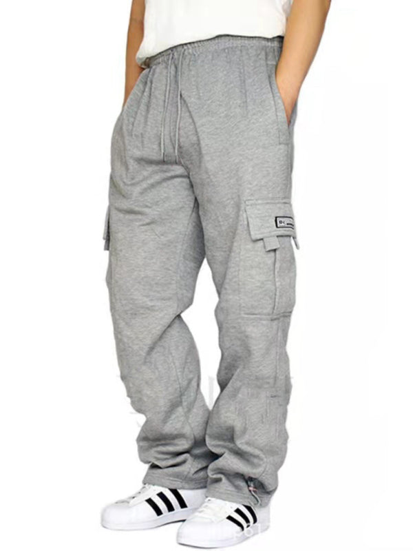 Elevate your style with our Multi-pocket men's baggy jogging pants. Made from premium 100% polyester, these pants are perfect for all four seasons. With a self design pattern and flap pockets, they offer both practicality and sophistication. Mix and match with our Black Friday Christmas Bundle 5 for $100 for a versatile and stylish wardrobe. The perfect blend of comfort and elegance for any occasion.