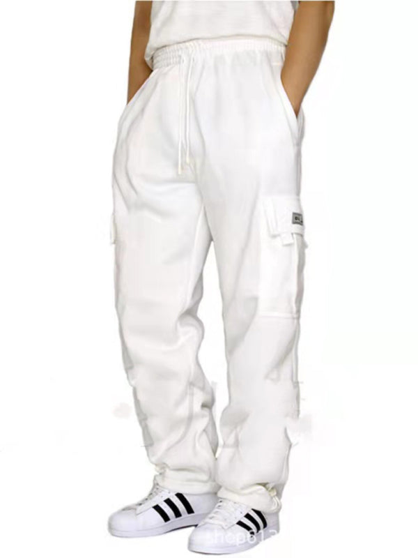 Elevate your style with our Multi-pocket men's baggy jogging pants. Made from premium 100% polyester, these pants are perfect for all four seasons. With a self design pattern and flap pockets, they offer both practicality and sophistication. Mix and match with our Black Friday Christmas Bundle 5 for $100 for a versatile and stylish wardrobe. The perfect blend of comfort and elegance for any occasion.