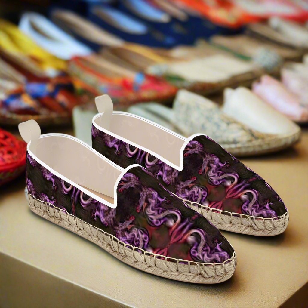 Unleash your inner dragon spirit with these designer espadrille flats! Each pair is handmade to order with my unique designs printed onto the canvas body. The rubberized sole provides durability while the natural jute sole adds a touch of earthy charm. Elevate your shoe game with these stylish and comfortable loafer espadrilles.